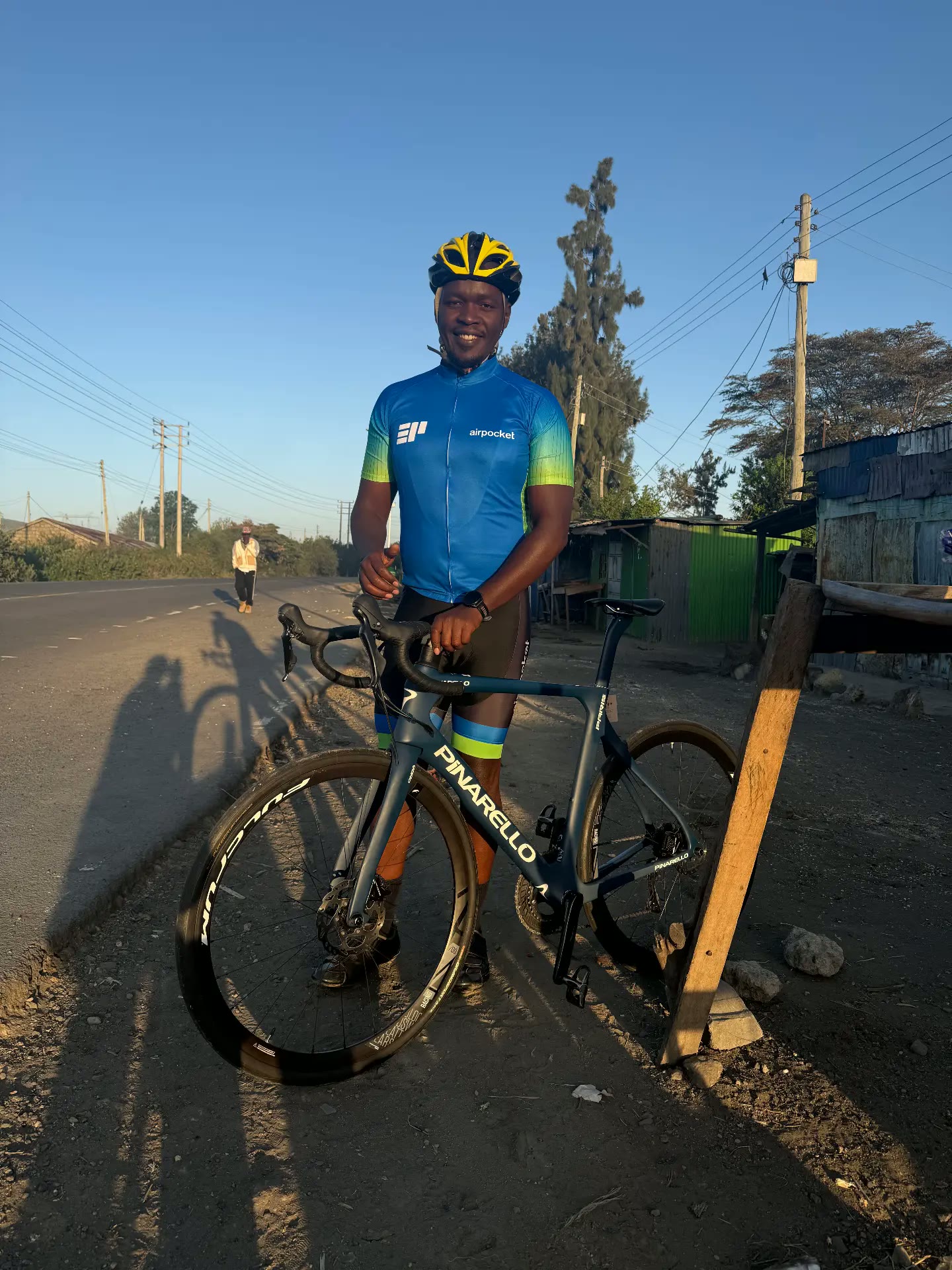 Brian in the Airpocket team jersey with his Pinarello at the roadside